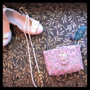 Mary Frances mini clutch/shoulder bag.